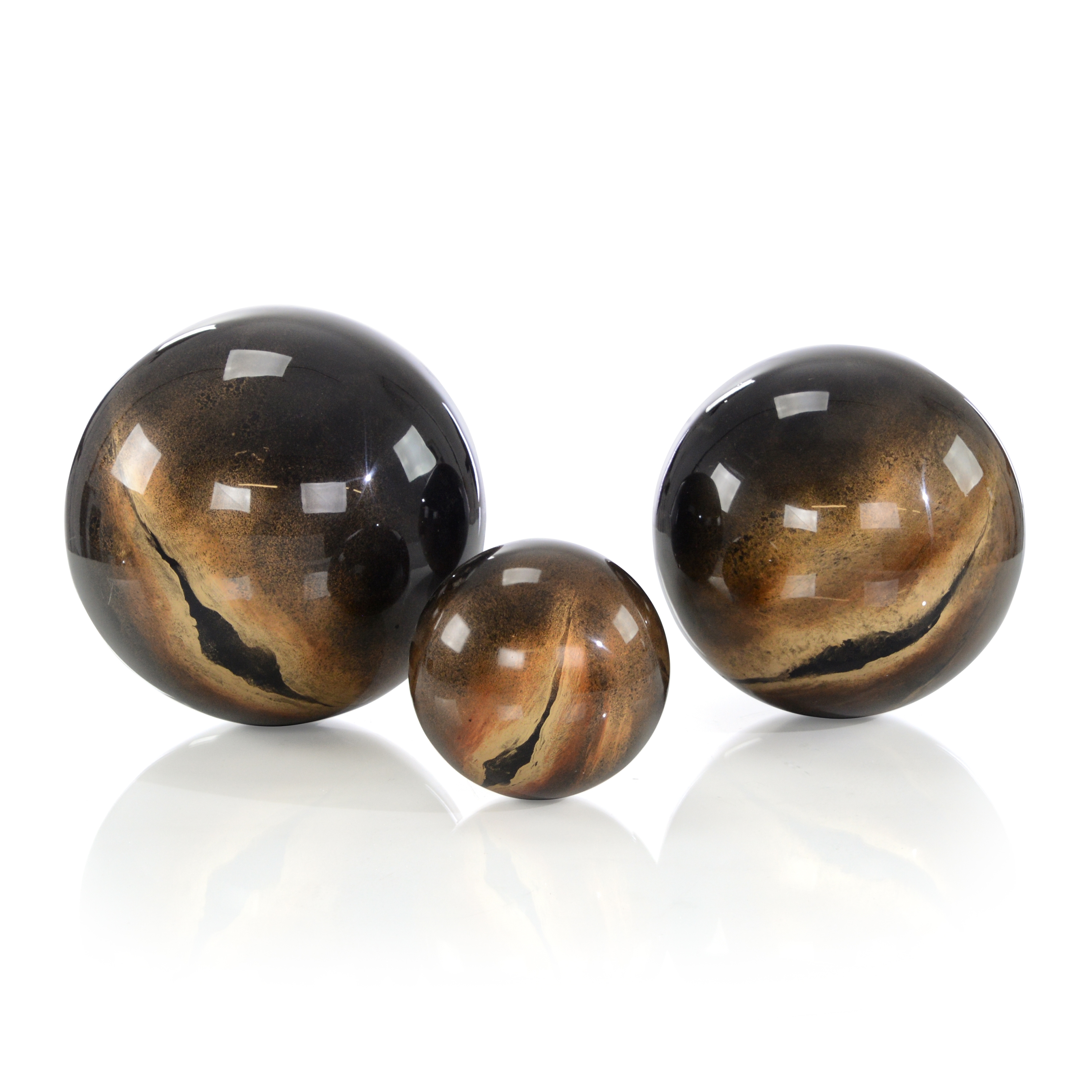 A Set of Three Decorative Lacero Balls