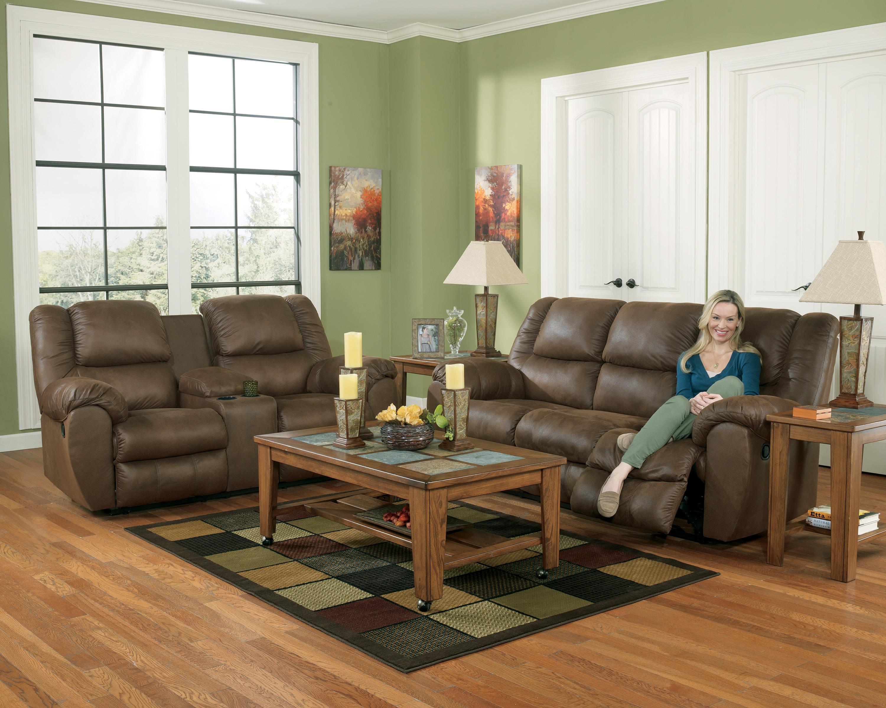 Benchcraft Quarterback Canyon Reclining Sofa in Faux Brown