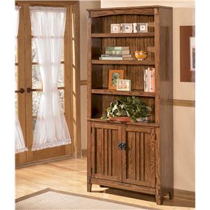Benchcraft Cross Island Large Door Bookcase