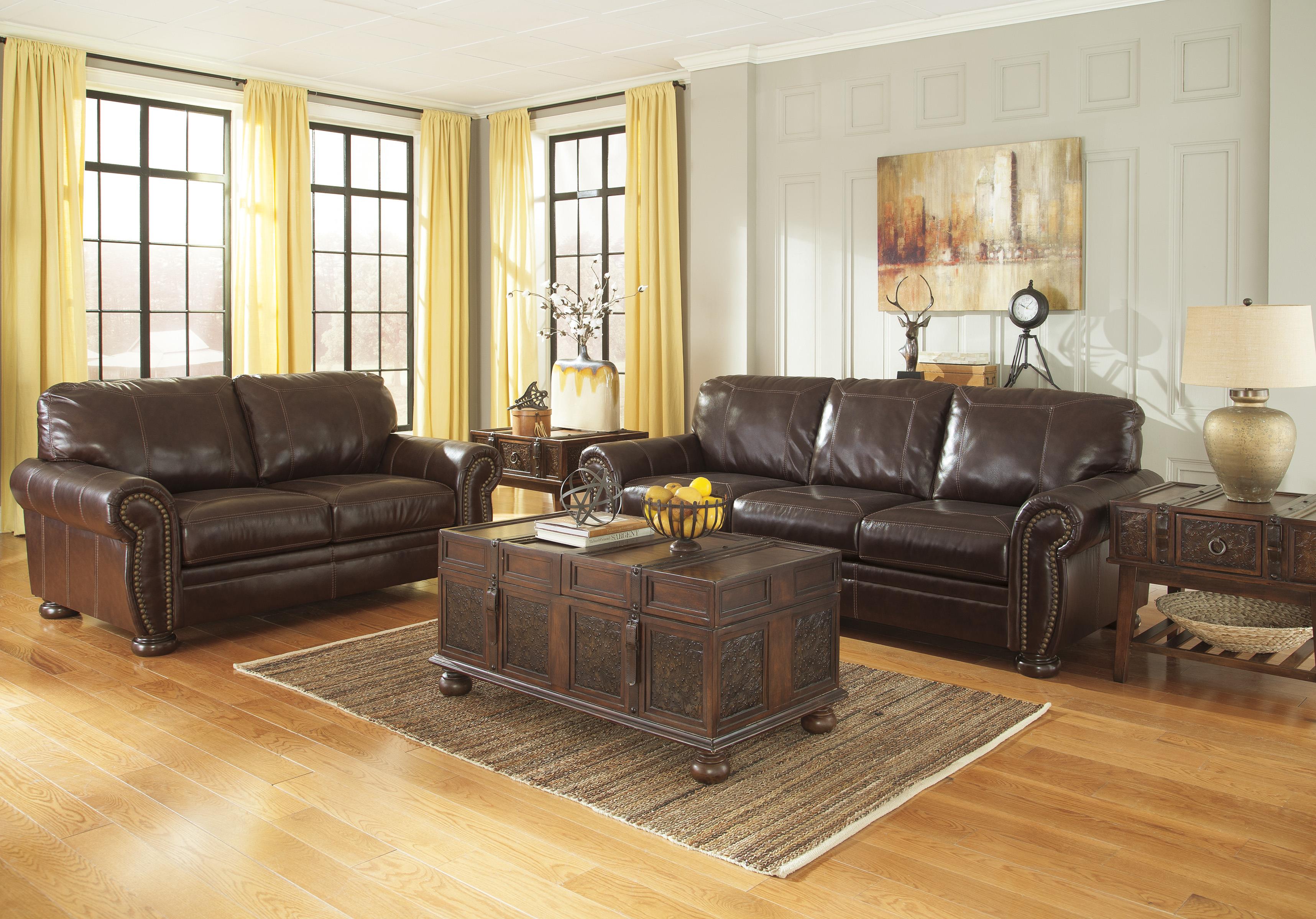 Signature Design by Ashley Banner Traditional Leather Match Sofa with Rolled Arms, Nailhead Trim ...