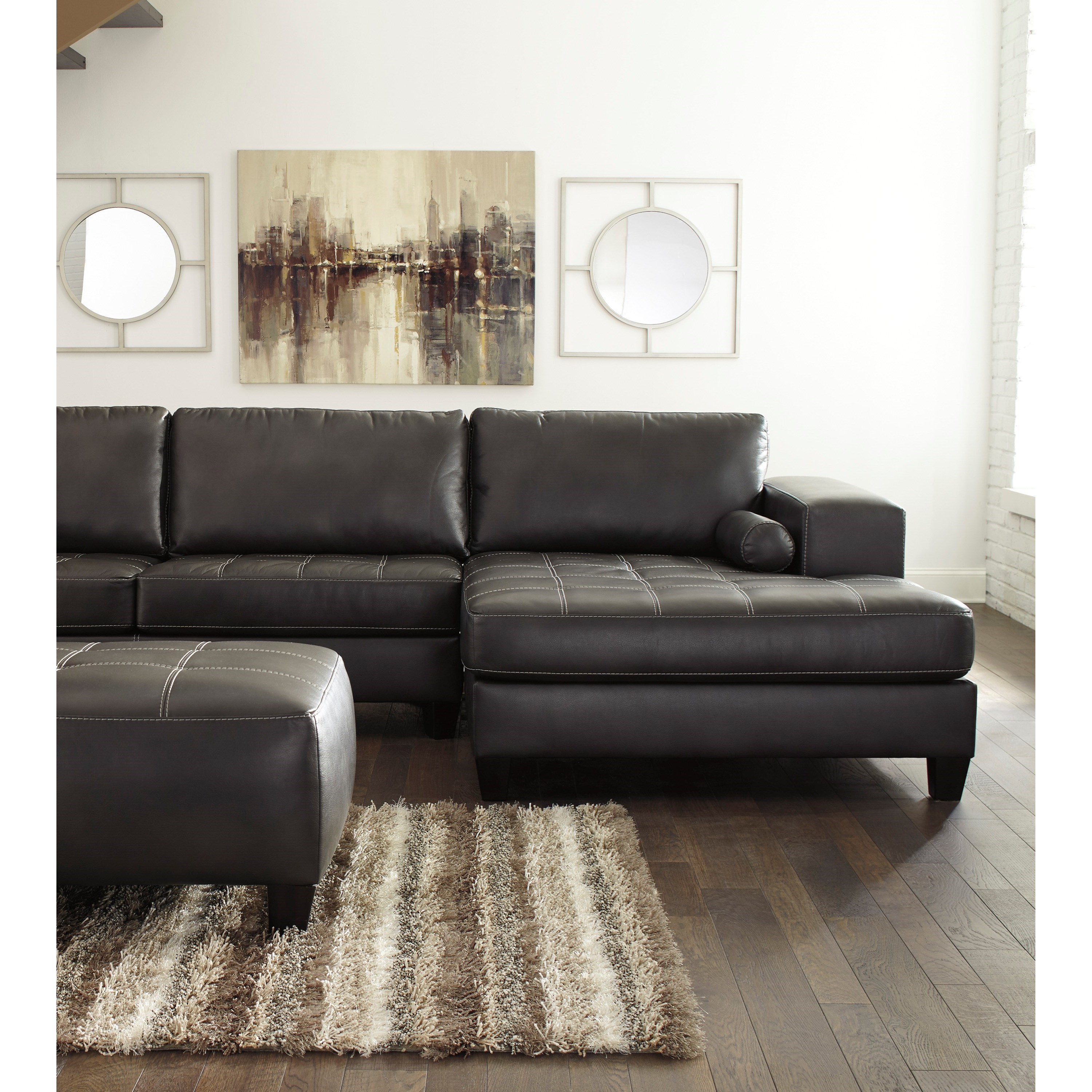 Signature Design by Ashley Nokomis Contemporary Faux Leather Sectional