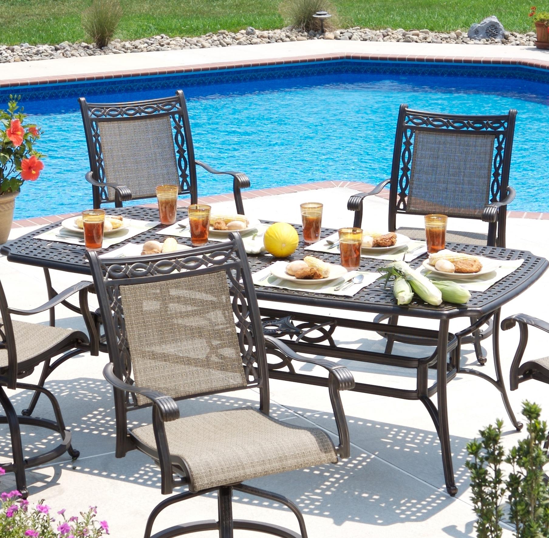 Agio Ashmost 7 Piece Sling Swivel Chair and Rectangular Cast Aluminum